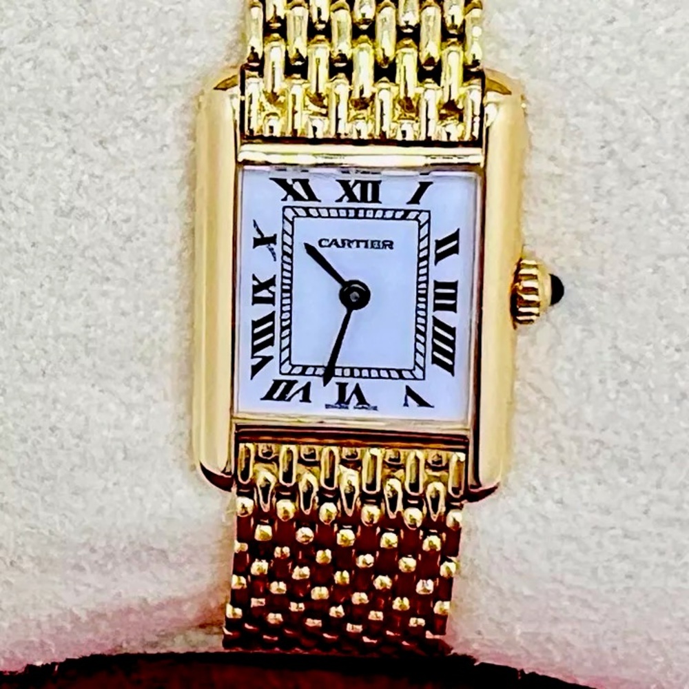 Cartier Ladies Tank Watch, 18k Gold 51.7 grams t.w., Roman Numerals, Quartz